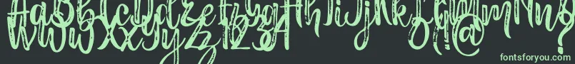 Masha Font – Green Fonts on Black Background