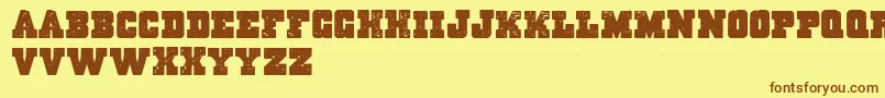 Massive Dynamite Font – Brown Fonts on Yellow Background