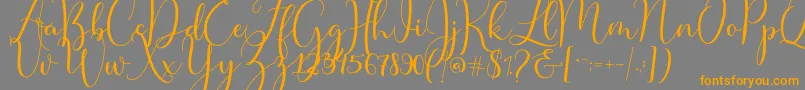 Master Script Font – Orange Fonts on Gray Background