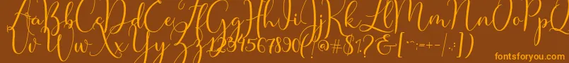Master Script Font – Orange Fonts on Brown Background