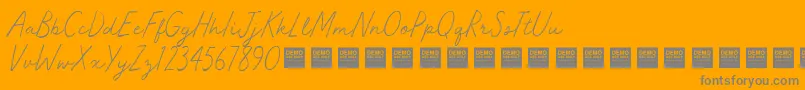 Master Works   Demo-Schriftart – Graue Schriften auf orangefarbenem Hintergrund