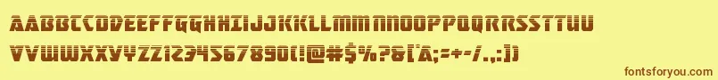 フォントmasterbreakerhalf – 茶色の文字が黄色の背景にあります。