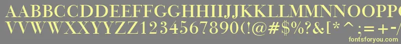 BauerBodoniTitlingBt Font – Yellow Fonts on Gray Background