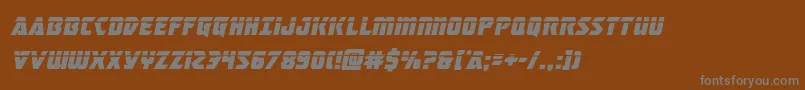 フォントmasterbreakerlaserital – 茶色の背景に灰色の文字