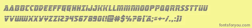 フォントmasterbreakerlaserital – 黄色の背景に灰色の文字
