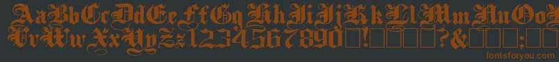PlainBlackWide-Schriftart – Braune Schriften auf schwarzem Hintergrund