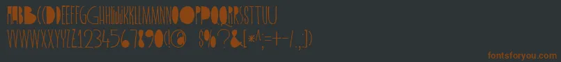 Шрифт DkSpiderlegsBlackened – коричневые шрифты на чёрном фоне
