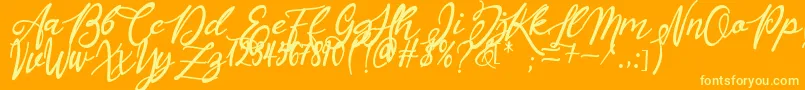 Masyieta Font – Yellow Fonts on Orange Background
