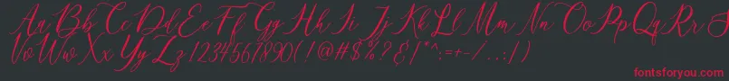 matania Font – Red Fonts on Black Background