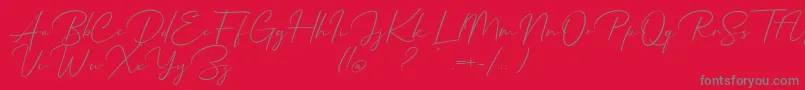 フォントMathanifo Script dafont – 赤い背景に灰色の文字