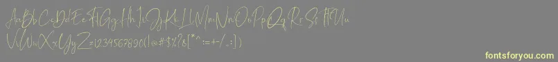 Mathelline Font – Yellow Fonts on Gray Background