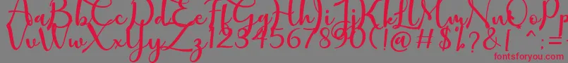 mathilda Font – Red Fonts on Gray Background