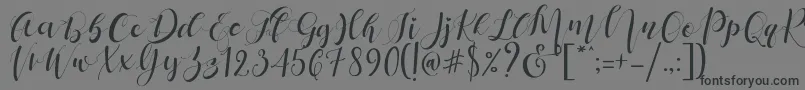Mattosa Script  -Schriftart – Schwarze Schriften auf grauem Hintergrund