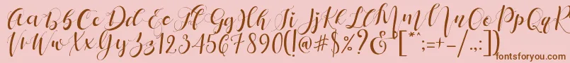 Mattosa Script  -Schriftart – Braune Schriften auf rosa Hintergrund