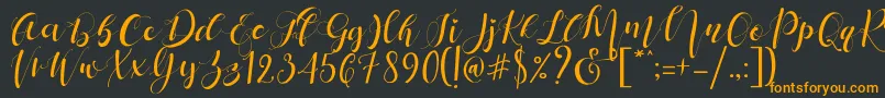 フォントMattosa Script   – 黒い背景にオレンジの文字