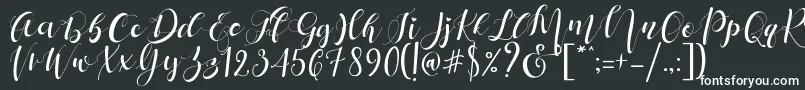 Mattosa Script  -Schriftart – Weiße Schriften auf schwarzem Hintergrund