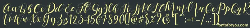 フォントMattosa Script   – 黒い背景に黄色の文字