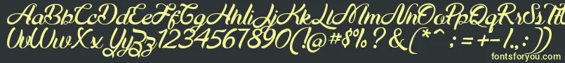 Maudy Script Free Demo Font – Yellow Fonts on Black Background