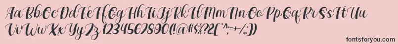 Maxeva by 7NTypes D Font – Black Fonts on Pink Background