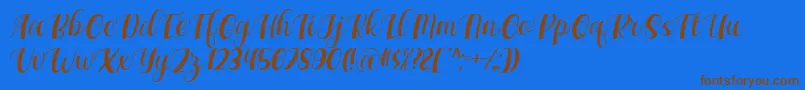 Fonte Maxeva by 7NTypes D – fontes marrons em um fundo azul