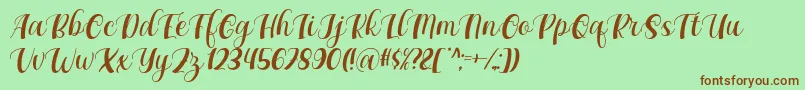 Maxeva by 7NTypes D Font – Brown Fonts on Green Background