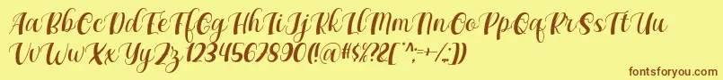 Maxeva by 7NTypes D Font – Brown Fonts on Yellow Background