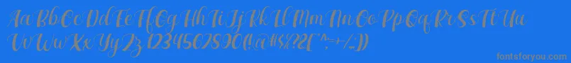 Maxeva by 7NTypes D-Schriftart – Graue Schriften auf blauem Hintergrund