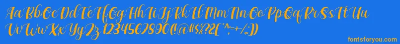 フォントMaxeva by 7NTypes D – オレンジ色の文字が青い背景にあります。
