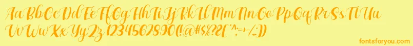 フォントMaxeva by 7NTypes D – オレンジの文字が黄色の背景にあります。