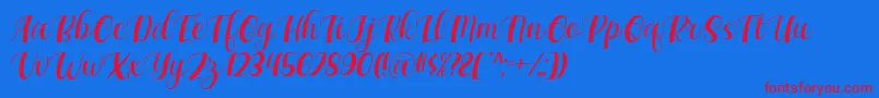 Maxeva by 7NTypes D Font – Red Fonts on Blue Background