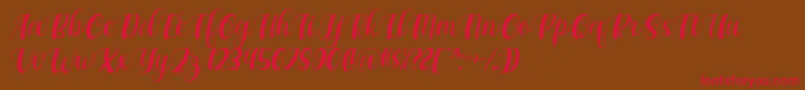 フォントMaxeva by 7NTypes D – 赤い文字が茶色の背景にあります。
