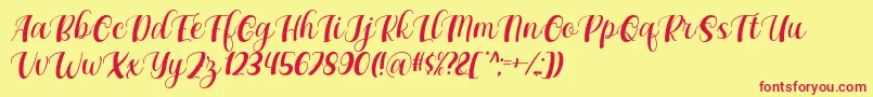 Maxeva by 7NTypes D-Schriftart – Rote Schriften auf gelbem Hintergrund