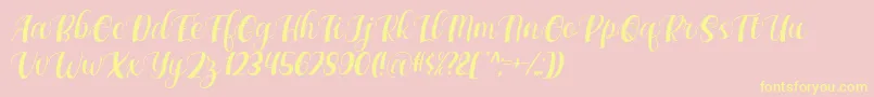 Maxeva by 7NTypes D Font – Yellow Fonts on Pink Background