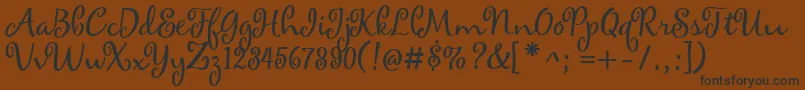 maya Font – Black Fonts on Brown Background