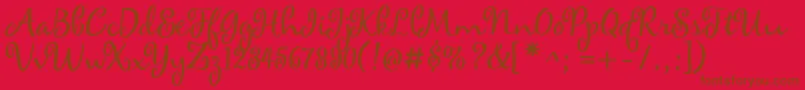 maya Font – Brown Fonts on Red Background