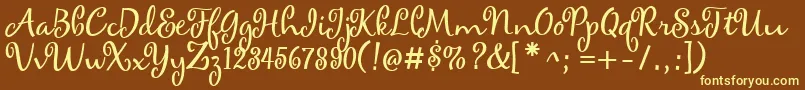 maya-fontti – keltaiset fontit ruskealla taustalla