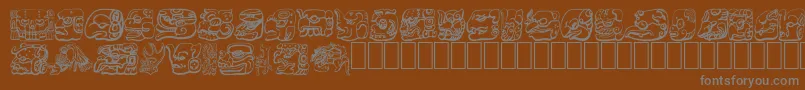 フォントMAYAN – 茶色の背景に灰色の文字