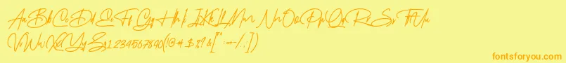 Mayestica Font – Orange Fonts on Yellow Background