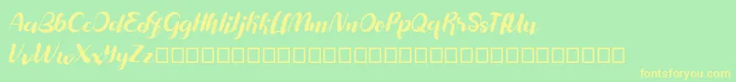 Maylanie Font – Yellow Fonts on Green Background