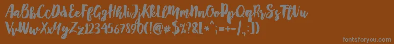 Mayton-Schriftart – Graue Schriften auf braunem Hintergrund