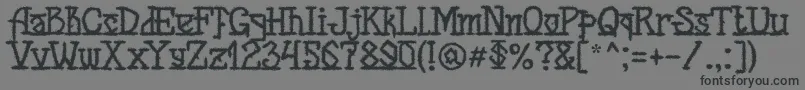 Шрифт MB Back for Death Font – чёрные шрифты на сером фоне