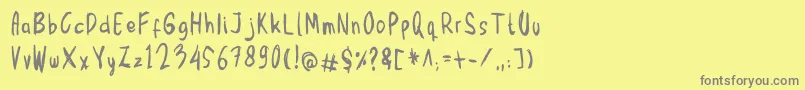 Mbak Mbik1 Font – Gray Fonts on Yellow Background