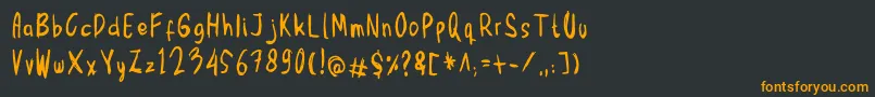 フォントMbak Mbik1 – 黒い背景にオレンジの文字