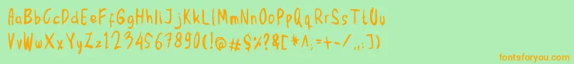 フォントMbak Mbik1 – オレンジの文字が緑の背景にあります。