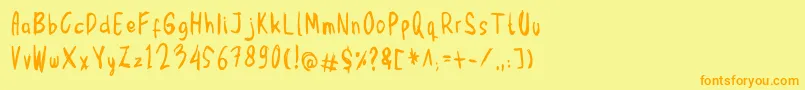 フォントMbak Mbik1 – オレンジの文字が黄色の背景にあります。