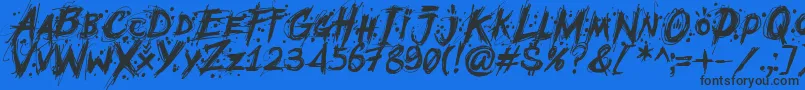 MCF Mudster Font – Black Fonts on Blue Background