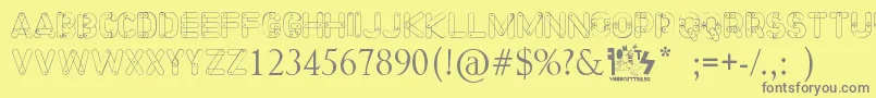 フォントMeccano Font – 黄色の背景に灰色の文字