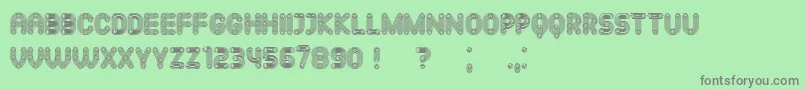 Mechanismo Font – Gray Fonts on Green Background