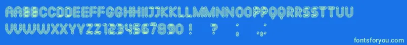 Mechanismo Font – Green Fonts on Blue Background