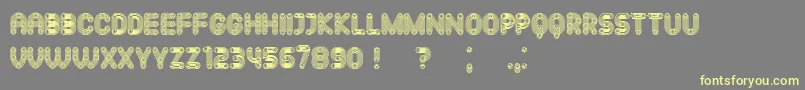 Mechanismo Font – Yellow Fonts on Gray Background